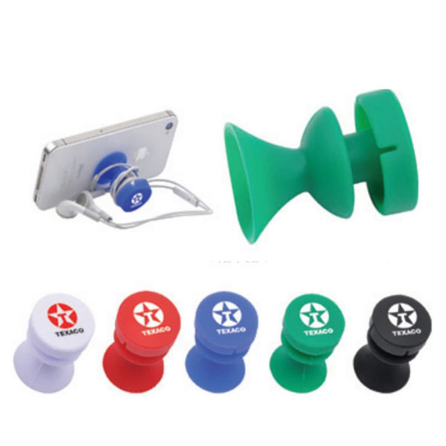 A range of mobile stands in white, green, red, and black, featuring a logo on each stand.