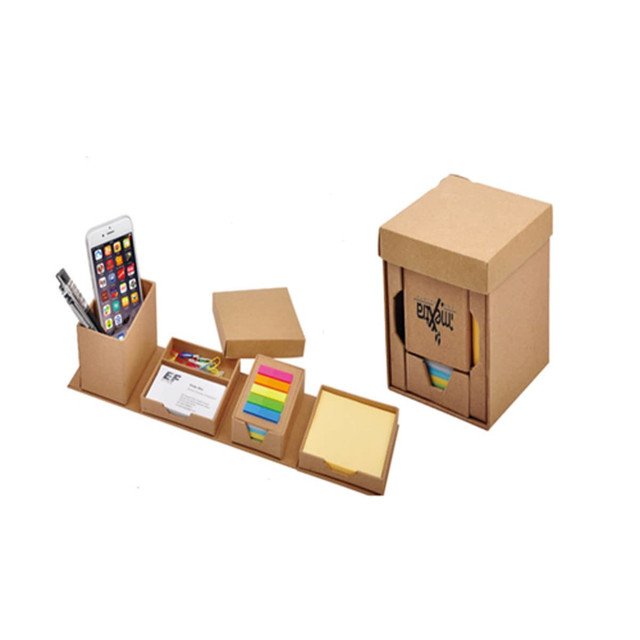 A memo holder in brown cardboard with compartments for sticky notes, pens, business cards, and a phone.