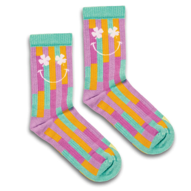 Colourful knitted bamboo socks in purple, turquoise, orange, and yellow with a smiley face and floral design.