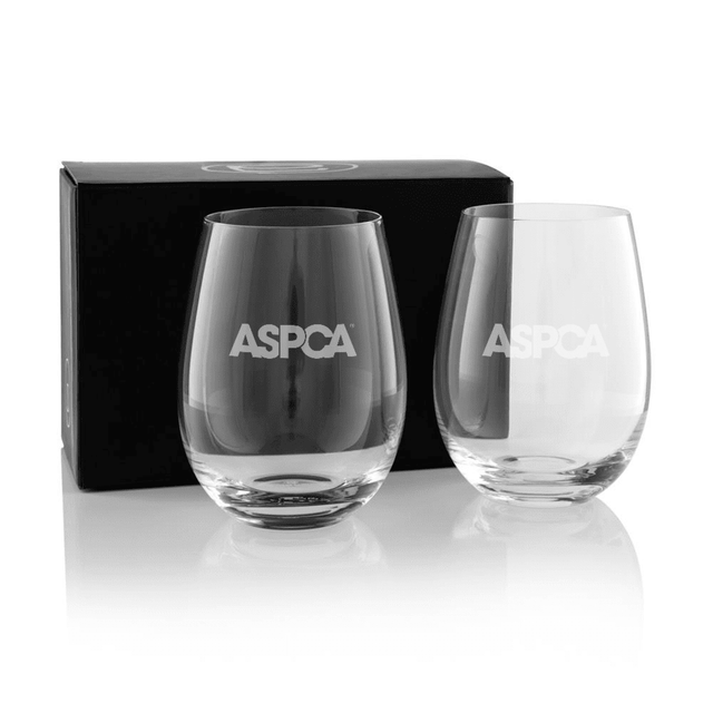 A twin pack of stemless wine glasses, clear with a branding logo, presented in a black box.
