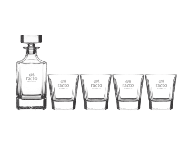 A whisky decanter set with a clear glass decanter and four matching tumblers, each featuring a logo.
