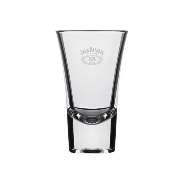 A shot glass in clear glass with a distinct shape and a logo etched on the front.