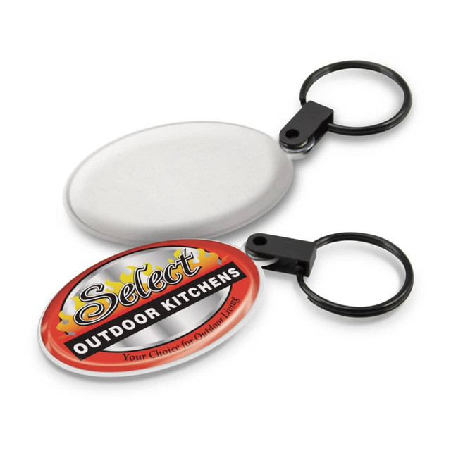 A key ring with a black keychain and two oval sections, one for cleaning screens and one featuring a logo.
