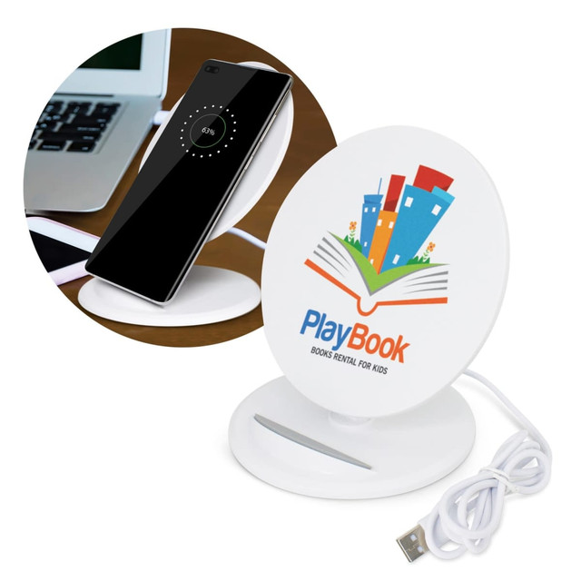 A round white wireless charging stand with a logo, displayed alongside a smartphone showing a charging indicator. A round white wireless charging stand with a logo, displayed alongside a smartphone showing a charging indicator.