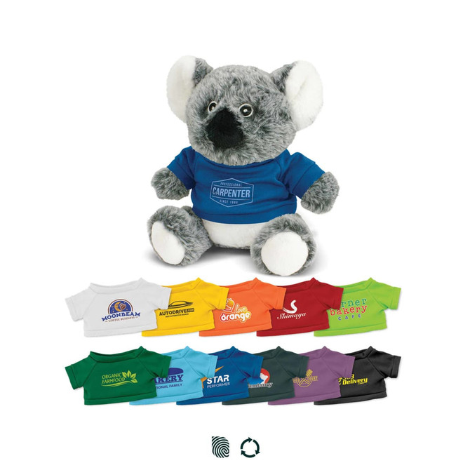 A grey koala plush toy wearing a blue shirt, surrounded by a variety of colourful miniature shirts in different styles.