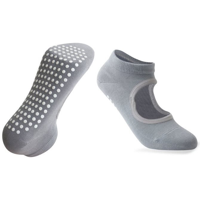 Open top yoga socks in grey with a non-slip dotted sole and a rounded design. Features a logo on the side.