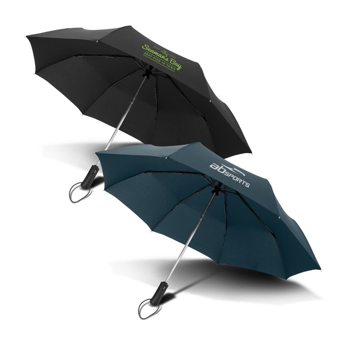 A compact umbrella with a black canopy and a teal canopy, featuring logos on both.
