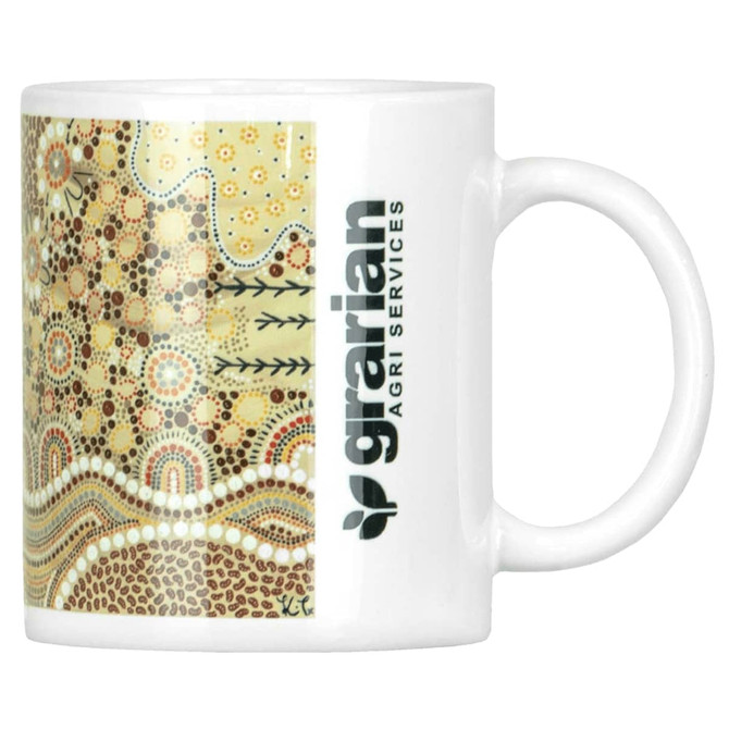 A ceramic coffee mug with a decorative Aboriginal-inspired design and a logo on the side.