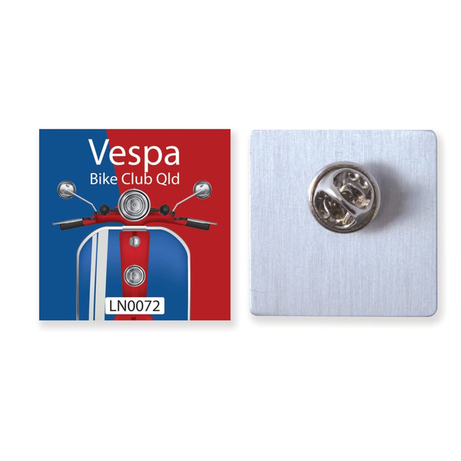 A 25mm aluminium badge featuring a colorful design and a pin backing for attachment.