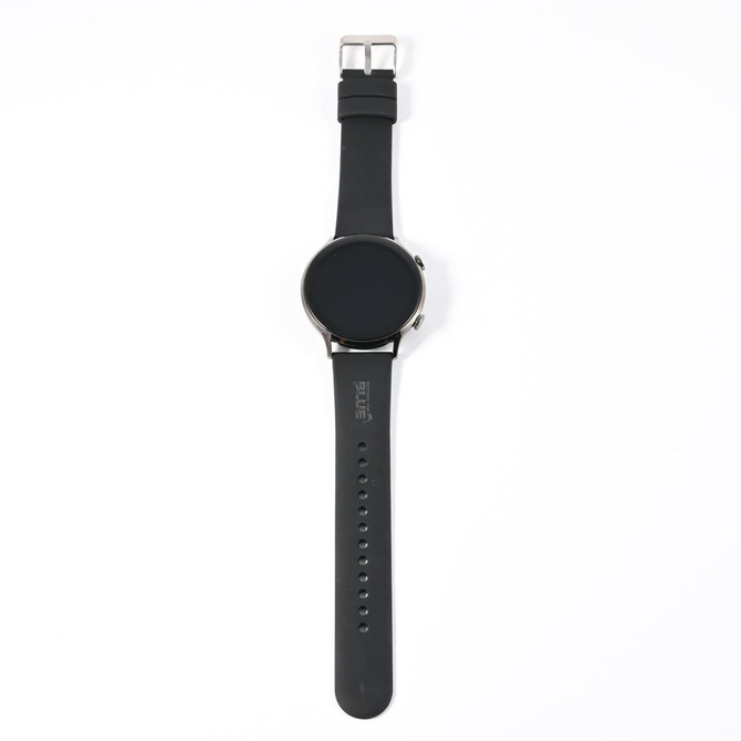 A black smart watch with a round face and a black strap, featuring a single side button and a minimalist design.