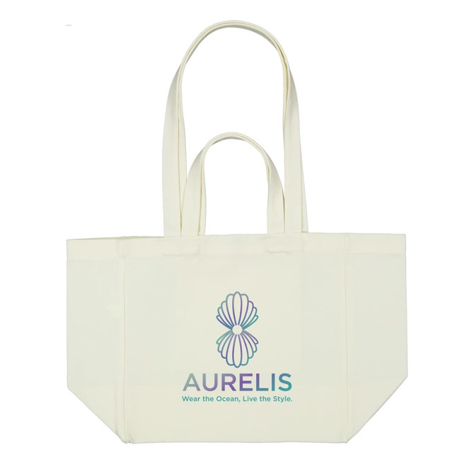 A light cream canvas bag with a colourful logo in the centre and two sturdy handles.