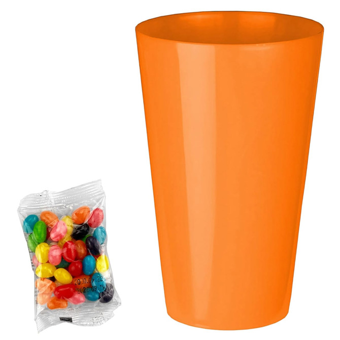 An orange cup next to a pouch filled with colourful jelly beans in various shades.