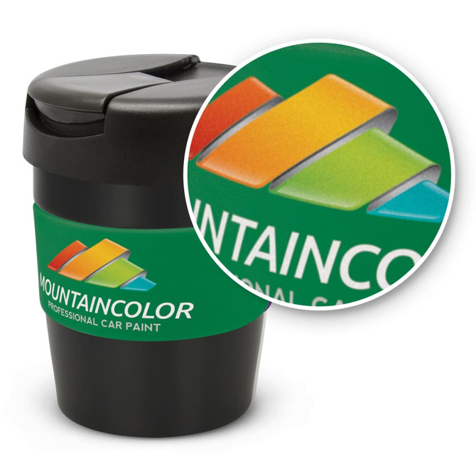 A drink bottle in black with a green sleeve, featuring a logo. The lid has a secure snap closure.