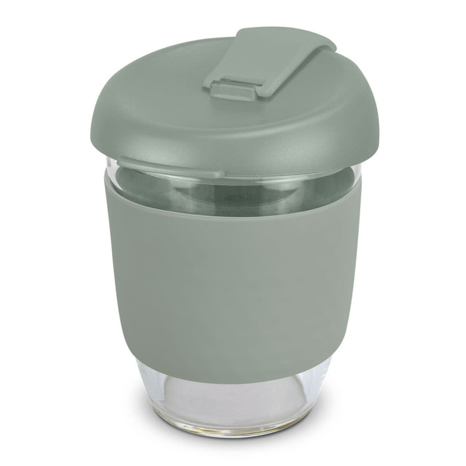 A drink bottle with a light green silicone sleeve and matching lid, featuring a clear borosilicate glass body.
