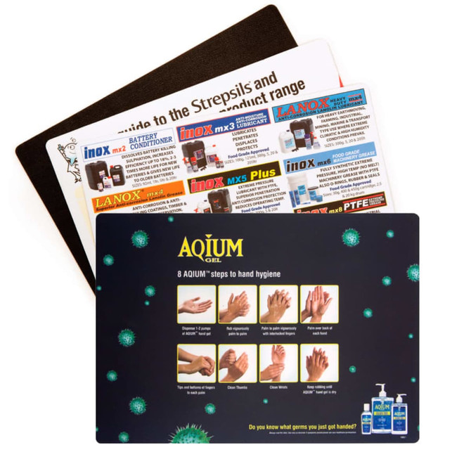 A collection of three counter mats, featuring various designs and instructions, predominantly in black and colourful themes.