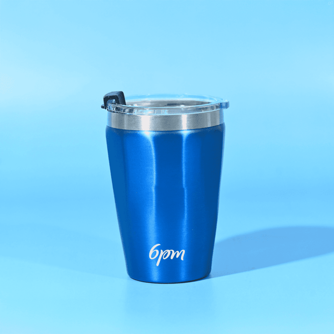 A drink tumbler with a sleek blue finish and silver rim, featuring a lid and a logo.