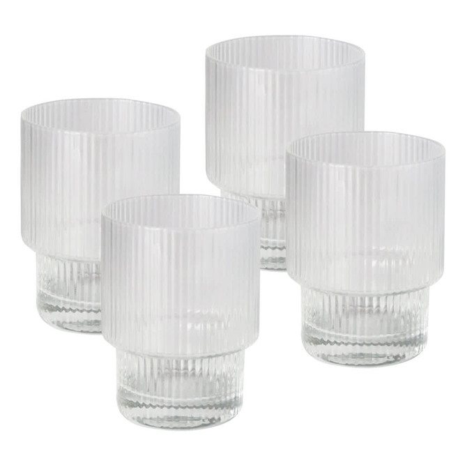 A set of four clear ribbed glass tumblers with a textured design and short bases.