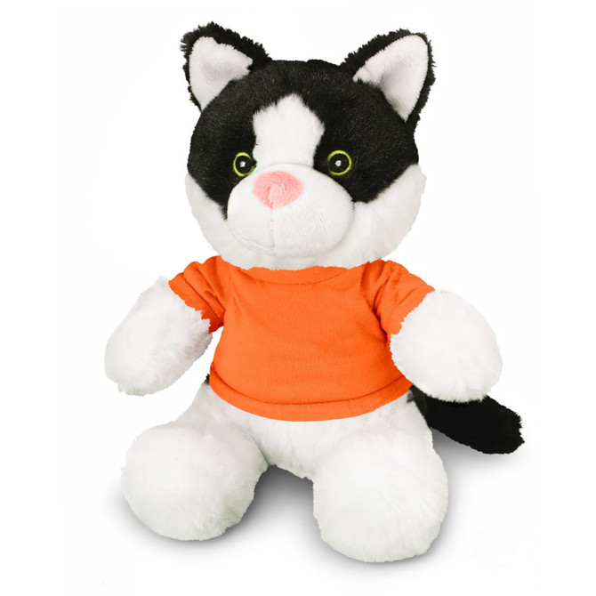 A black and white plush cat toy wearing an orange shirt, featuring green eyes and a fluffy tail.