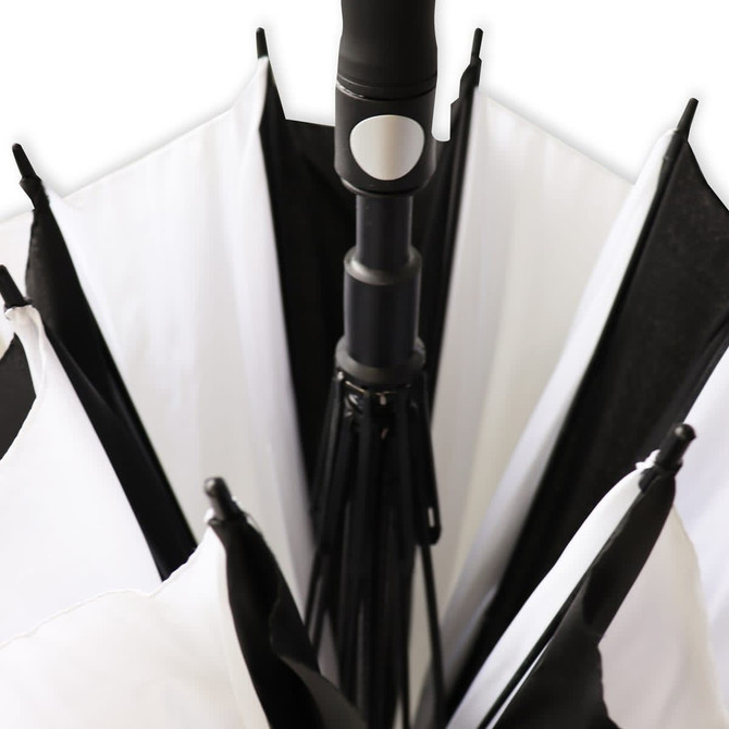 A black and white umbrella with a central handle, featuring a sleek design and a branding logo.