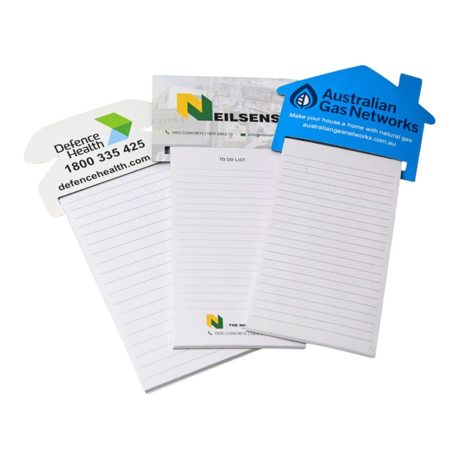 A collection of three rectangular magnetic to-do lists, featuring varying designs and colours, with some having logos.