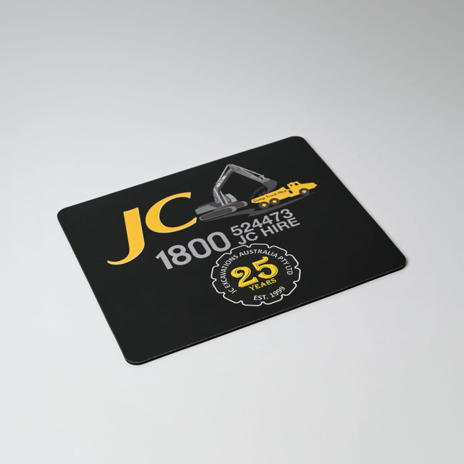A black mouse mat featuring yellow graphics and text, including a logo and contact information.