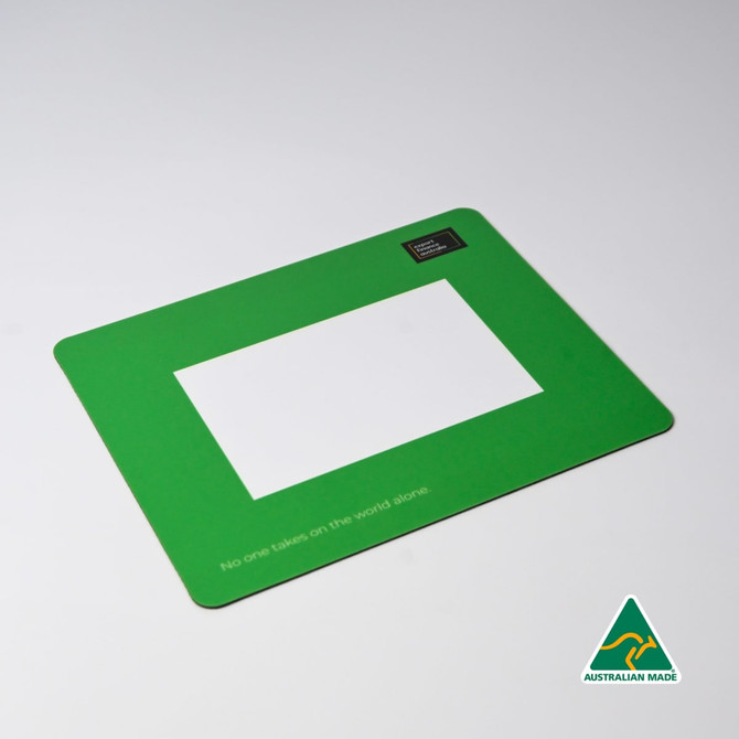 A green mouse mat featuring a central photo frame cut-out and a logo in one corner.