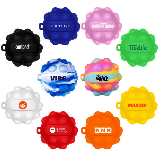 A collection of stress balls in various colours, including black, pink, blue, green, yellow, orange, and white, with logos.