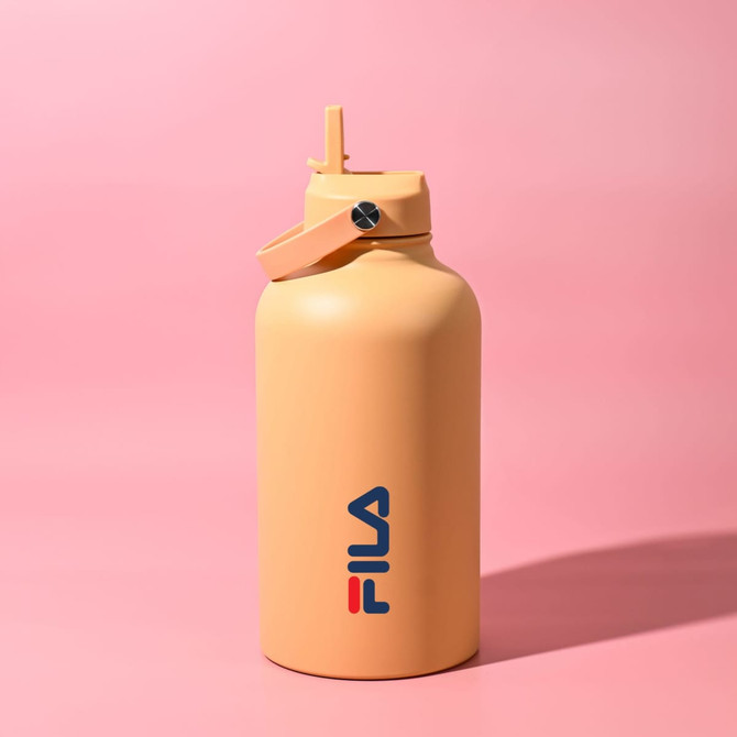 A drink bottle in a soft orange colour with a screw-top lid and a logo on the front.