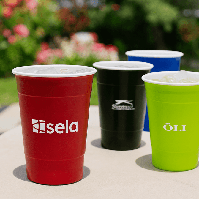A drink cup set featuring red, green, black, and blue plastic cups, each with a logo on them.