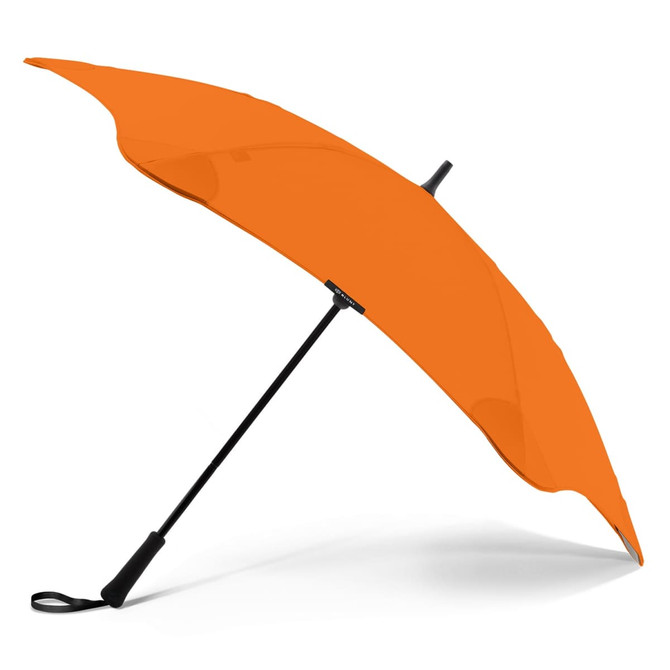 An orange BLUNT Classic Umbrella with a sleek black handle, featuring a curved canopy design and a branding logo.