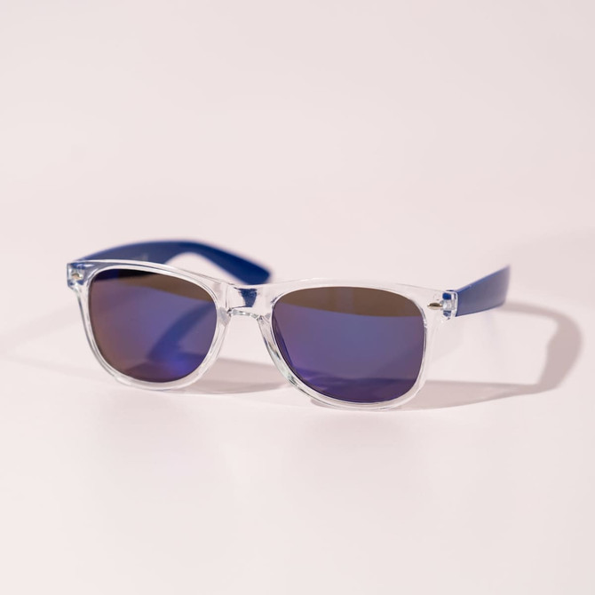 Clear sunglasses with blue arms and gradient lenses, resting on a pale background. The sunglasses feature a logo.