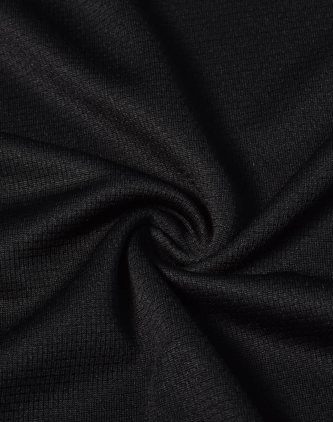 A black, lightweight fabric displaying a smooth, textured surface in a swirling design. The material is versatile and breathable.