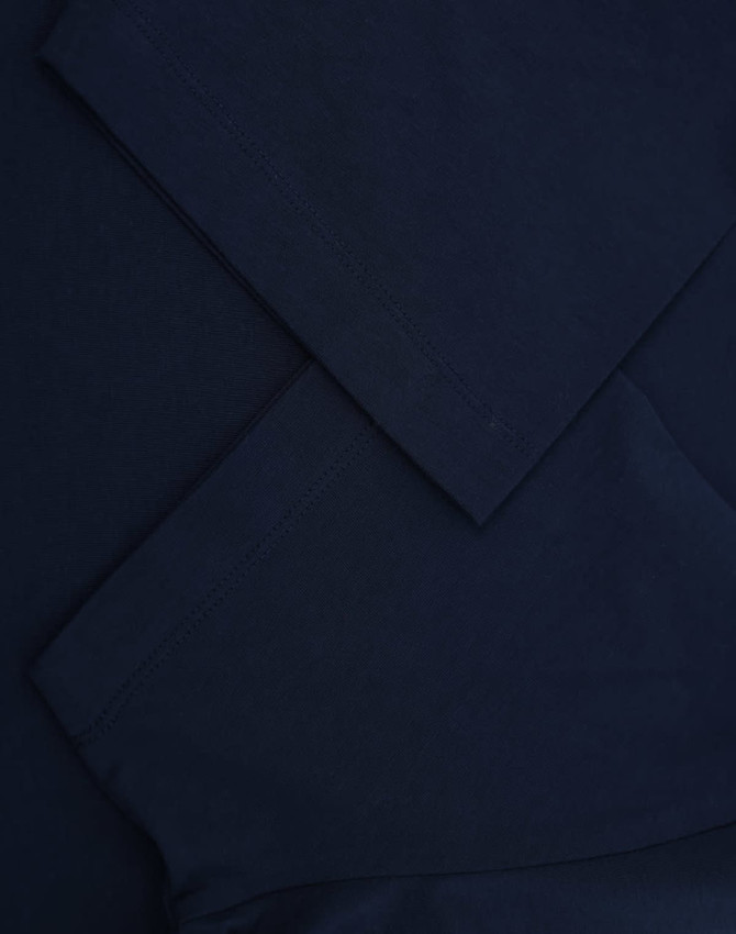 A navy blue premium cotton short-sleeve T-shirt with neatly folded sleeves. It features a logo on the fabric.