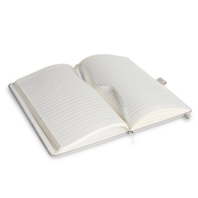 A recycled notebook with a grey cover, featuring blank lined pages and an overall minimalist design.