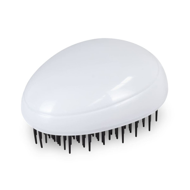 A white hair detangler with black bristles, shaped like a smooth, curved pebble. It has a logo on the surface.