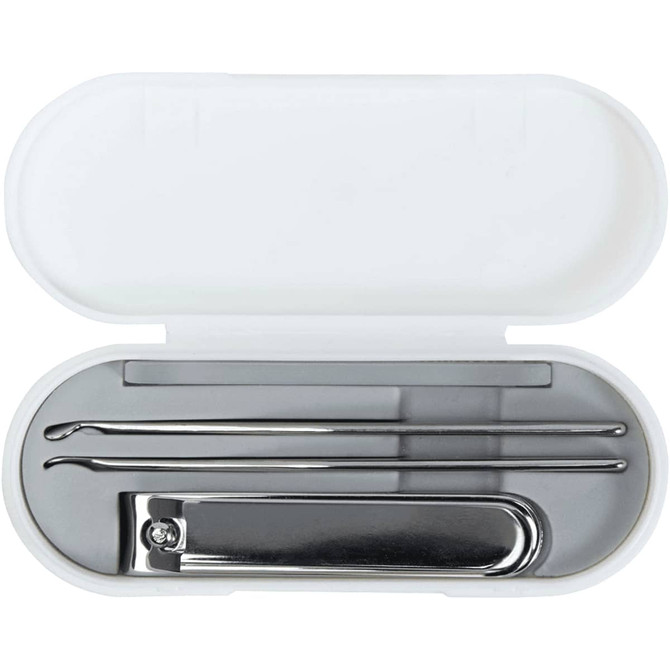 A white manicure set case containing metal tools including a nail clipper and two cuticle pushers.