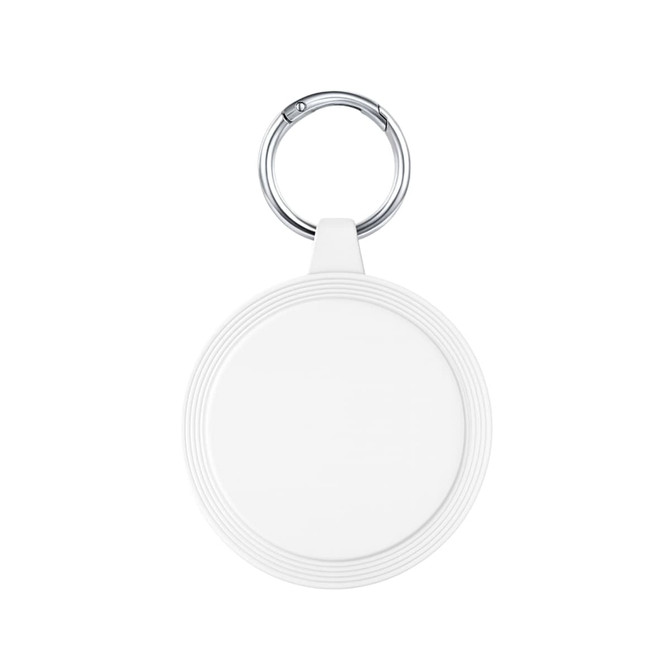 A keyring with a round, white attachment featuring a textured rim, ideal for holding keys or small items.