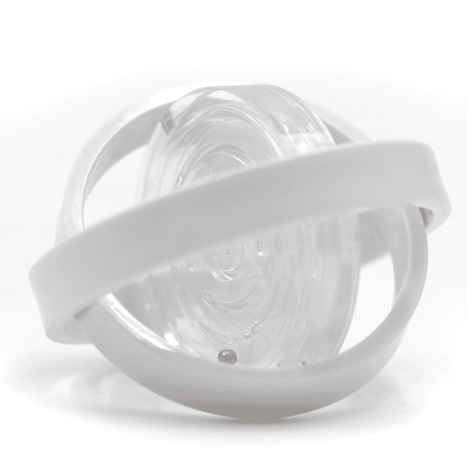 A clear fidget toy with a white band encircling a spinning inner component. Features a smooth, transparent design.