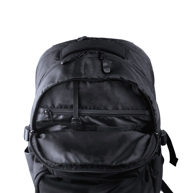 A black computer backpack with a wide opening, featuring a large compartment and a small zippered pocket inside.