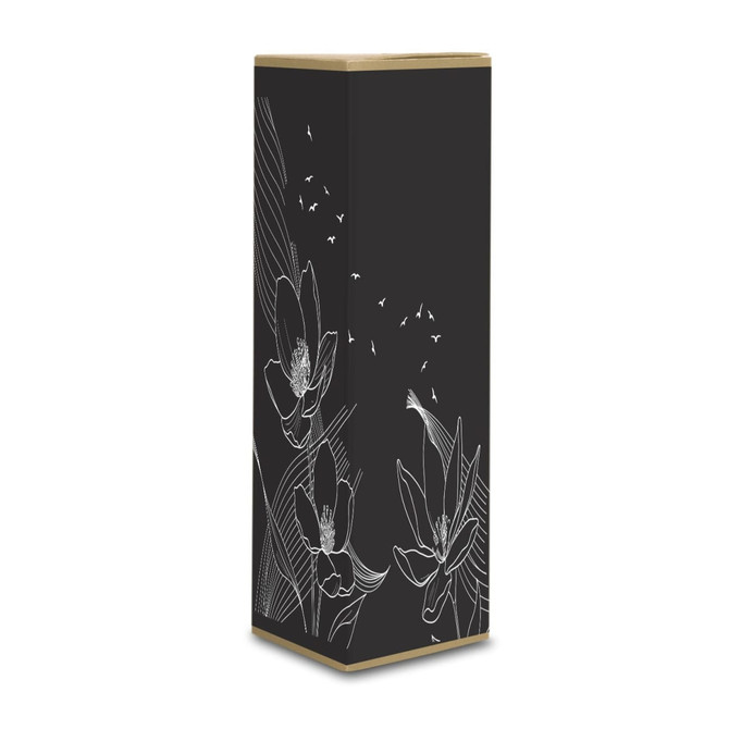 A tall patterned box featuring white floral illustrations on a black background, with a gold top edge.