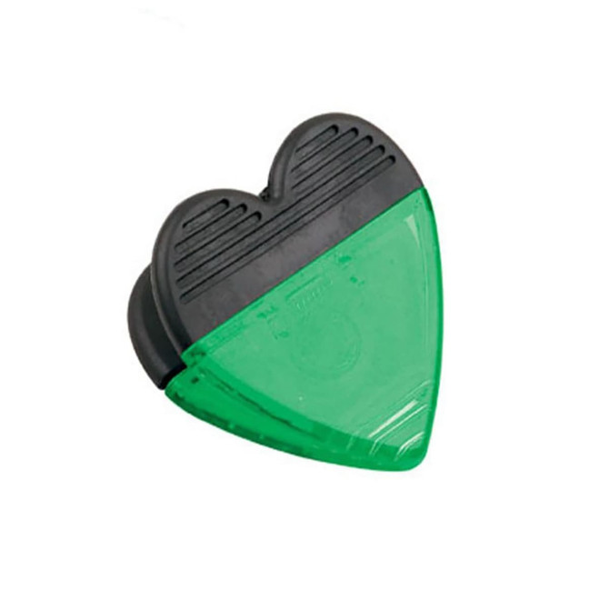 A green heart-shaped clip with a black top and a magnetic back, designed for office use.