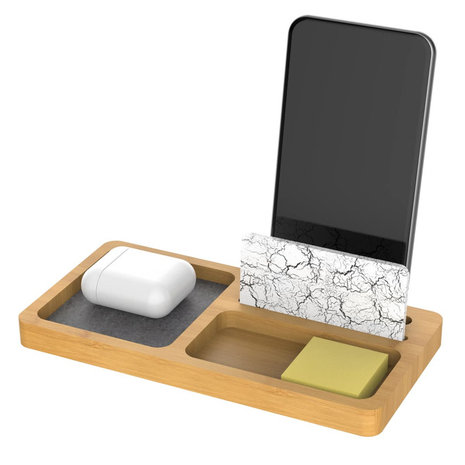 A bamboo phone stand and pen holder featuring a marble-textured section, a compartment for earbuds, and a sticky note pad.