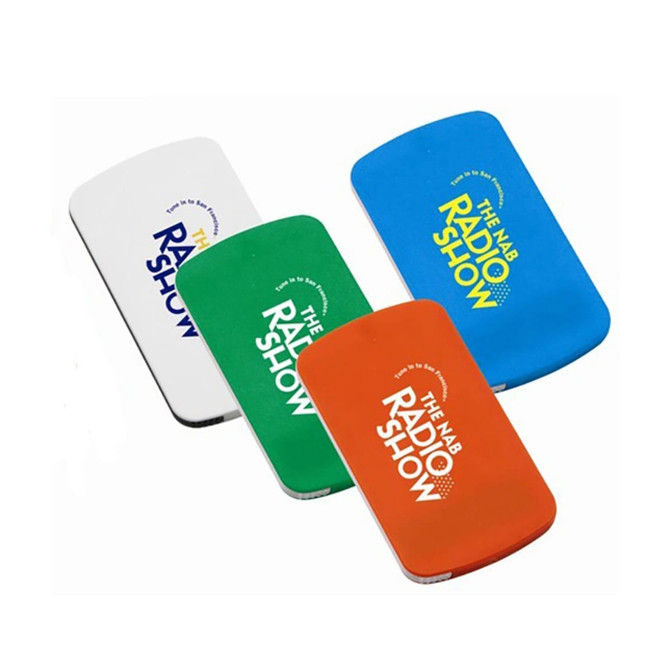 A set of four promotional mirrors in white, green, blue, and orange, each featuring a logo.