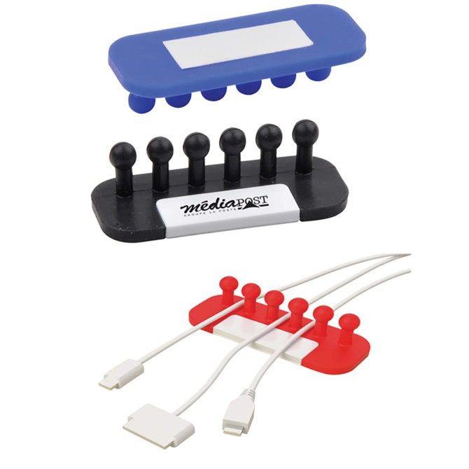 A set of three cable organisers in blue, black, and red, featuring various pegs for tidying cables. Each has a logo.