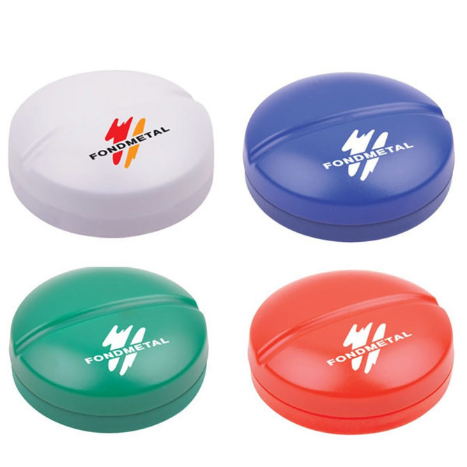 A collection of four pill boxes in white, blue, green, and red, each featuring a logo.