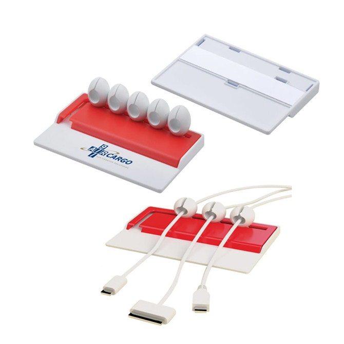 A cable organiser in white and red, featuring multiple slots for holding cables and a logo on one side.