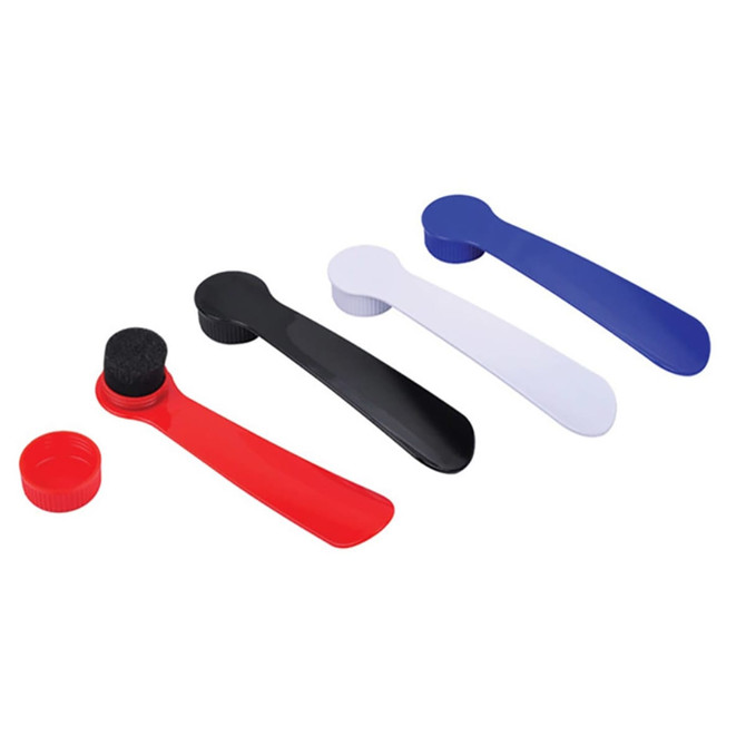 A set of four shoe horns and brushes in red, black, white, and blue, featuring a cap for storage.