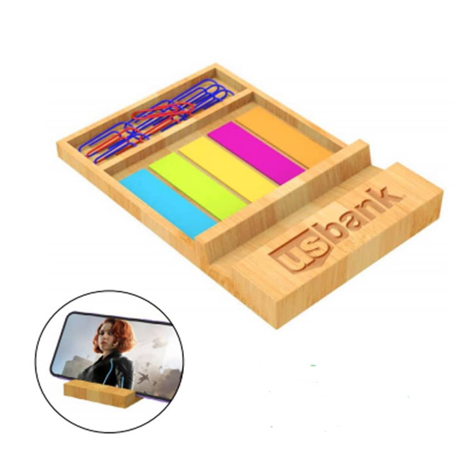 A bamboo mobile holder and memo holder featuring colourful sticky notes and paper clips. The product includes branding.
