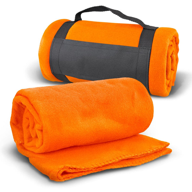 An orange fleece blanket rolled up with a black strap for easy carrying.