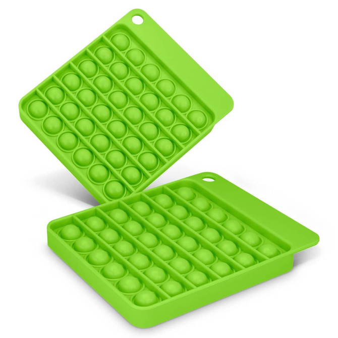 A green Pop Bubble Board featuring a grid of raised bubbles in a square shape, with a handle on one side.